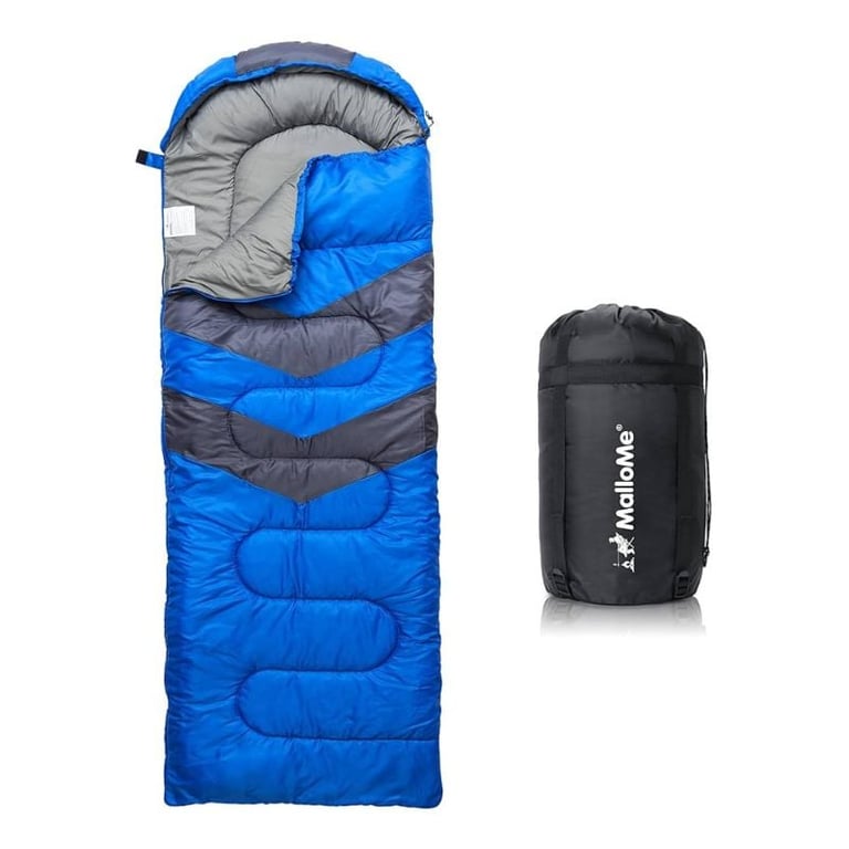 Blue and gray sleeping bag displayed open next to its black compression carry bag